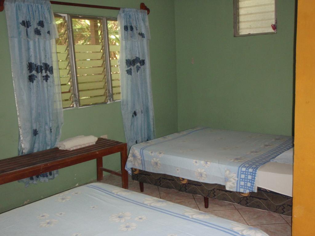 Guest House Posada Ixchel El Remate Habitación foto